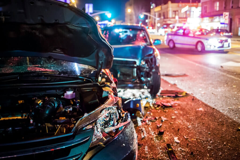 two vehicles involved in a collision at night